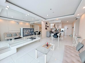 Deluxe Apartment | Living area - Restful And Simple 2Br At The Via And The Vue Apartment (Surabaya)