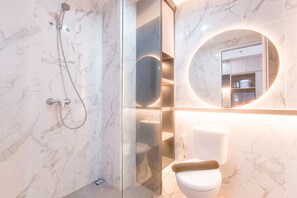 Deluxe Studio | Bathroom | Shower, free toiletries, towels, soap - Good Place And Comfy Studio At Anwa Residence Apartment (South Tangerang)
