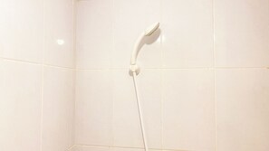 Deluxe Studio | Bathroom | Shower, free toiletries, towels, soap - Cozy And Good Choice Studio Apartment At Tokyo Riverside Pik 2 (Teluknaga)