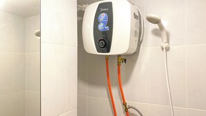 Deluxe Studio | Bathroom | Shower, free toiletries, towels, soap - Good Place Studio Apartment At Tokyo Riverside Pik 2 (Teluknaga)