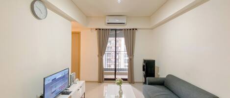 Apartamento Deluxe | Zona de estar