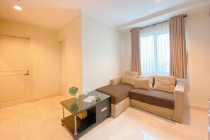 Deluxe Apartment | Living area - Cozy And Elegant 1Br Apartment The Boulevard (Jakarta)
