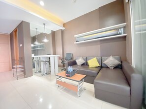 Deluxe Apartment | Living area - Serene Abode 1Br At Dago Suites Apartment (Bandung)