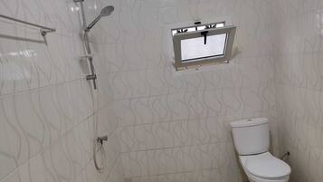 Shower, towels, toilet paper