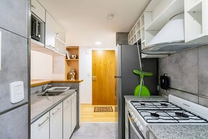 Comfort Apartment, City View | Private kitchenette | Coffee/tea maker, electric kettle