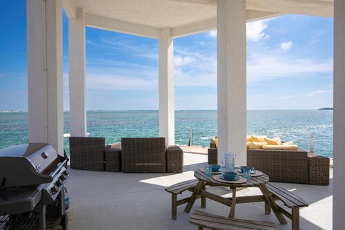Caribbean Blue #517 Oceanfront Retreat with Dock, Pool & Stunning Views