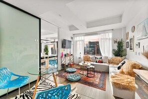 TV, fireplace, books, offices