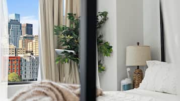 2 habitaciones, tabla de planchar con plancha, cuna de viaje y wifi