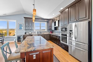 Fridge, microwave, oven, stovetop - "Gnozo Palazzo" 6 Bedroom, 6.5 Bathroom Oceanfront Home with Pool! (Holden Beach)