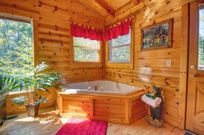 Jetted tub, hair dryer, towels, soap