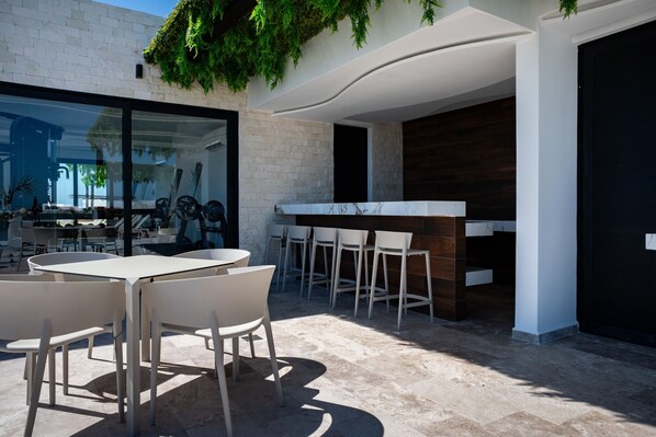Outdoor dining - Menesse Town Tower 203 1 Bedroom Condo (Playa del Carmen)