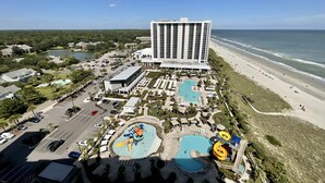 A resort with a large building, a swimming pool, and a beach. - 1703 Brighton, Newly Remodeled Condo With Full Access! 3 Bedroom Condo (Myrtle Beach)