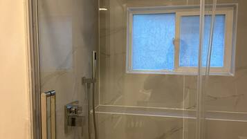 Hair dryer, towels, soap, shampoo