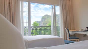 Deluxe Twin Room, Mountain View | Minibar, in-room safe, desk, free WiFi