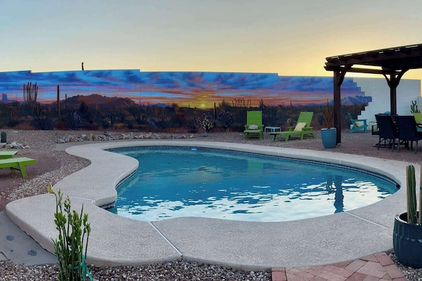 Find your oAZis. Gorgeous mural, heated pool, lots of seating. Fun for all.