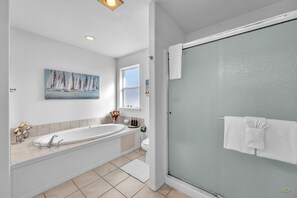 Shower, jetted tub, hair dryer, towels