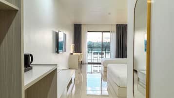 Premium bedding, desk, laptop workspace, free WiFi
