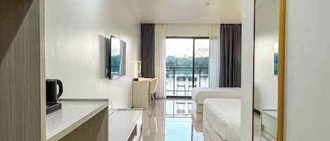 Premium bedding, desk, laptop workspace, free WiFi