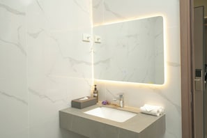 Shower, rainfall showerhead, hair dryer, towels