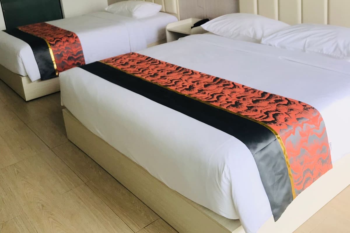 Premium bedding, desk, laptop workspace, free WiFi