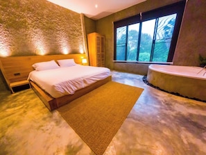 Superior Jacuzzi Room | Escritorio, wifi gratis, ropa de cama