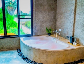 Superior Jacuzzi Room | Bathroom | Separate bathtub and shower, free toiletries, hair dryer, towels - R Resident Resort  (Phetchaburi)