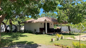 Deluxe Bungalow, Pool View | In-room safe, individually decorated, individually furnished, desk