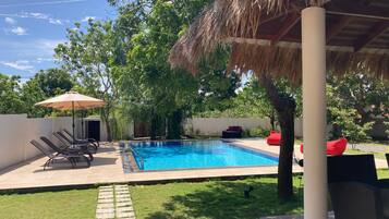 Deluxe Bungalow, Pool View | 1 bedroom, in-room safe, individually decorated, individually furnished