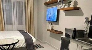 1 habitación, tabla de planchar con plancha, wifi y ropa de cama 