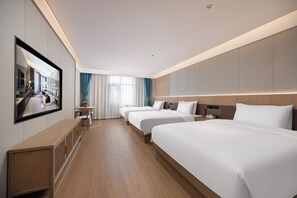 Family Quadruple Room, City View | 1 bedroom, desk, blackout curtains, soundproofing