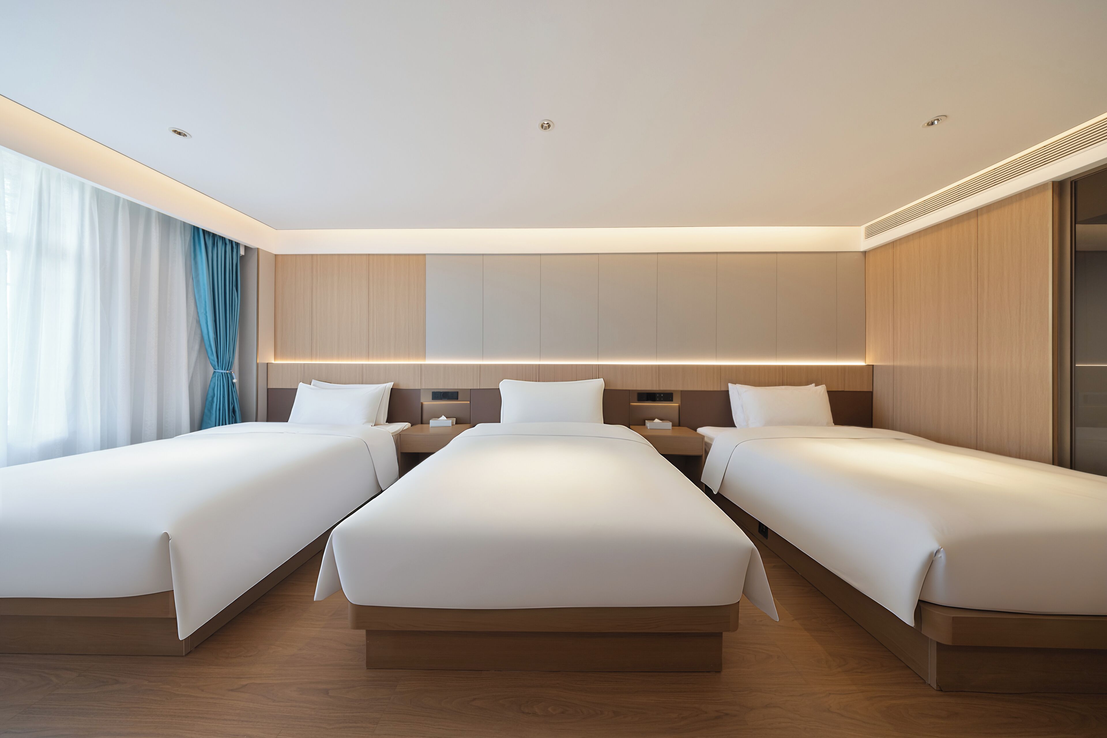 Family Quadruple Room, City View | Desk, blackout drapes, soundproofing, iron/ironing board