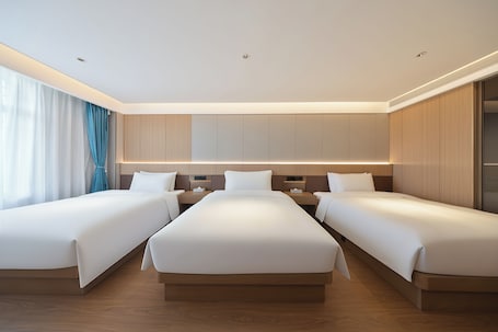 Family Quadruple Room, City View | 1 bedroom, desk, blackout drapes, soundproofing