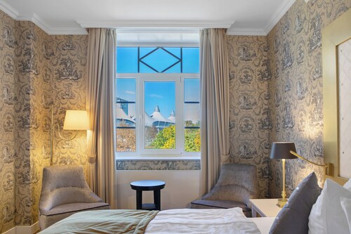 Ferienwohnung 'Suite 23' mit Bergblick, Gemeinschaftsterrasse und Wi-Fi