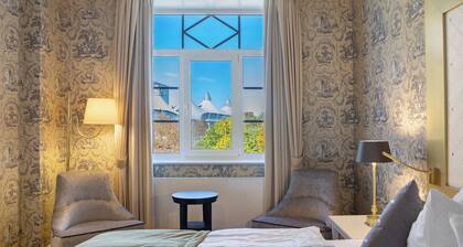 Ferienwohnung 'Suite 23' mit Bergblick, Gemeinschaftsterrasse und Wi-Fi