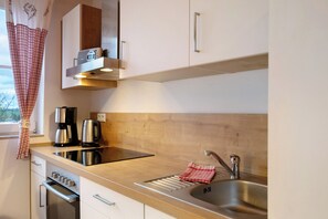 Réfrigérateur, four, plaque de cuisson, lave-vaisselle