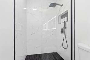 Hair dryer, towels, soap, shampoo