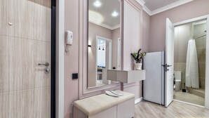 Shower, towels, soap, toilet paper