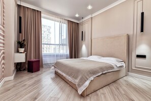 1 dormitorio, tabla de planchar con plancha, wifi y ropa de cama