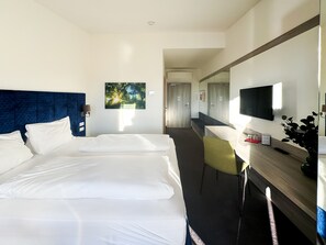 Een minibar, geluiddichte muren, gratis wifi, beddengoed