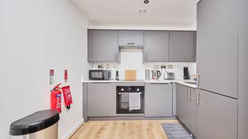 Apartment | Private kitchen | Fridge, microwave, oven, stovetop