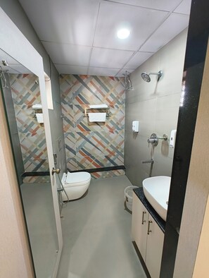 Deluxe Double Room, City View | Bathroom | Slippers, towels, soap, shampoo - Treebo Moon Waalk, Patia (Bhubaneshwar)