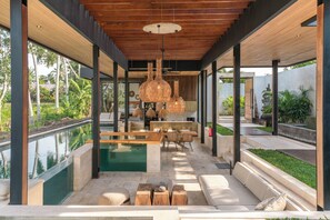 Luxury Villa, Patio, Pool View | Living area | Flat-screen TV