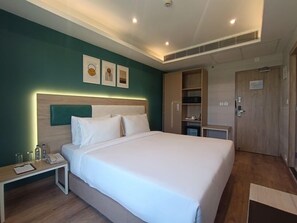 Ropa de cama de alta calidad y minibar 