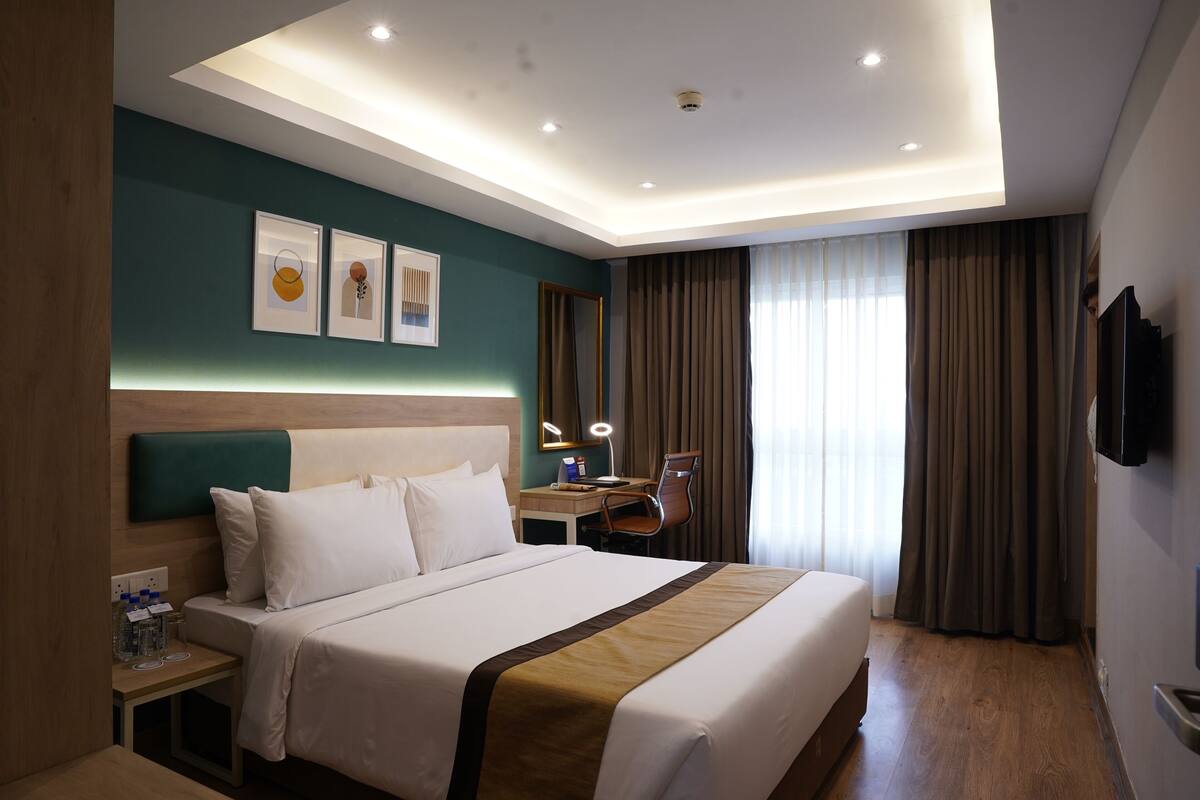 ห้องดีลักซ์, เตียงใหญ่ 1 เตียง | เครื่องนอนระดับพรีเมียม, มินิบาร์, ตู้นิรภัยในห้องพัก, โต๊ะทำงาน