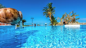 Seasonal outdoor pool, pool umbrellas, pool loungers