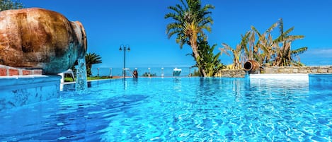 Seasonal outdoor pool, pool umbrellas, pool loungers
