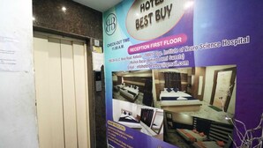 A hotel reception area with a check-out time of 11:00 A.M. on the first floor. - hotel best buy (Kolkata)