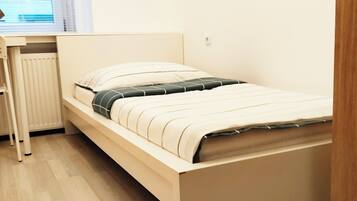 Basic - Einzelzimmer, Stadtblick (n20) | Wi-Fi de cortesia, roupa de cama