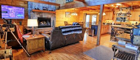 Smart-tv, eldstad, tv-spel och bordsfotboll