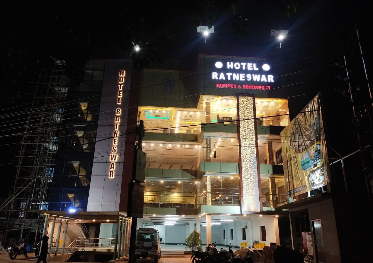 Hotel Ratneswar with a modern facade, multiple floors, and a prominent entrance.